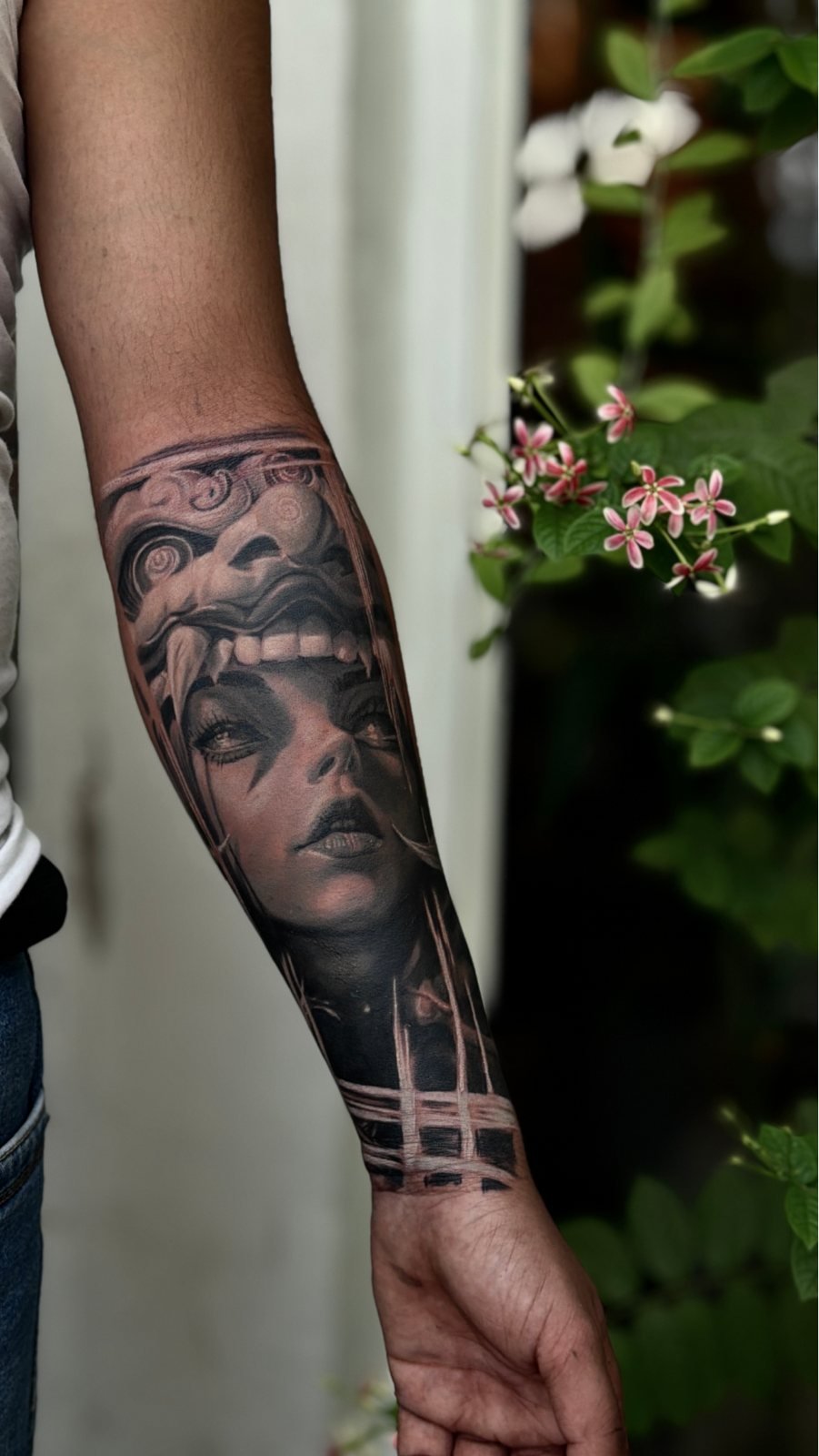 Realistic forearm sleeve tattoo