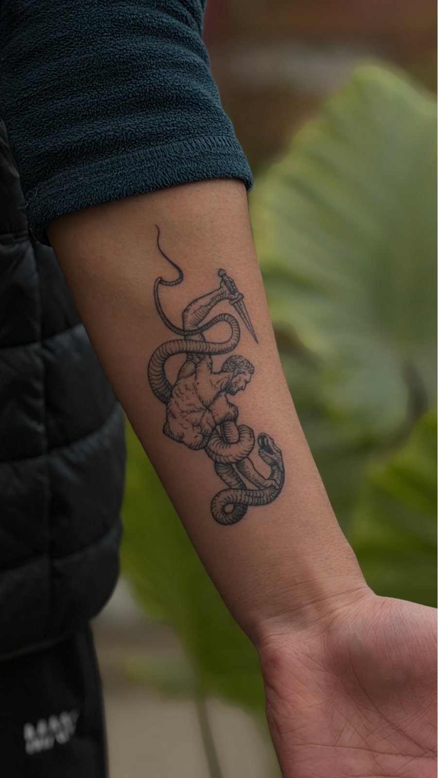 Snake linework tattoo